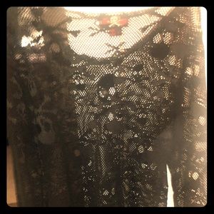 Black top rebel style with Skulls